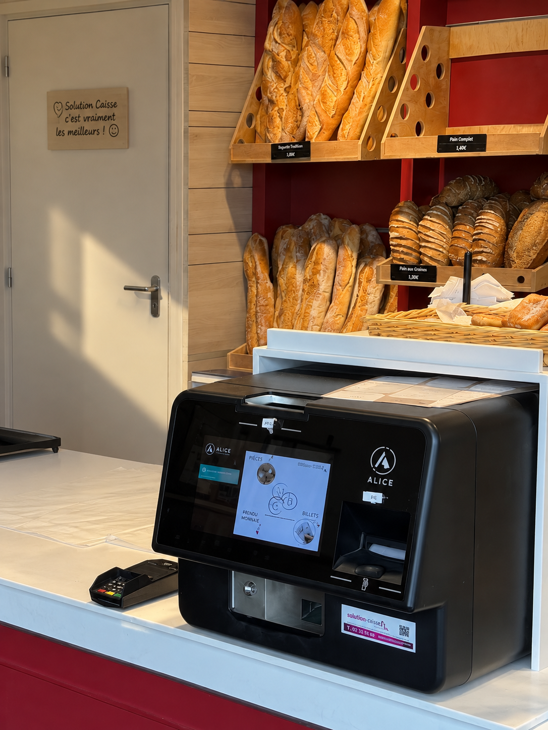 Monnayeur automatique ALICE installé dans un commerce